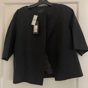 Derek Lam 3/4 length sleeve jacket. Single top button.